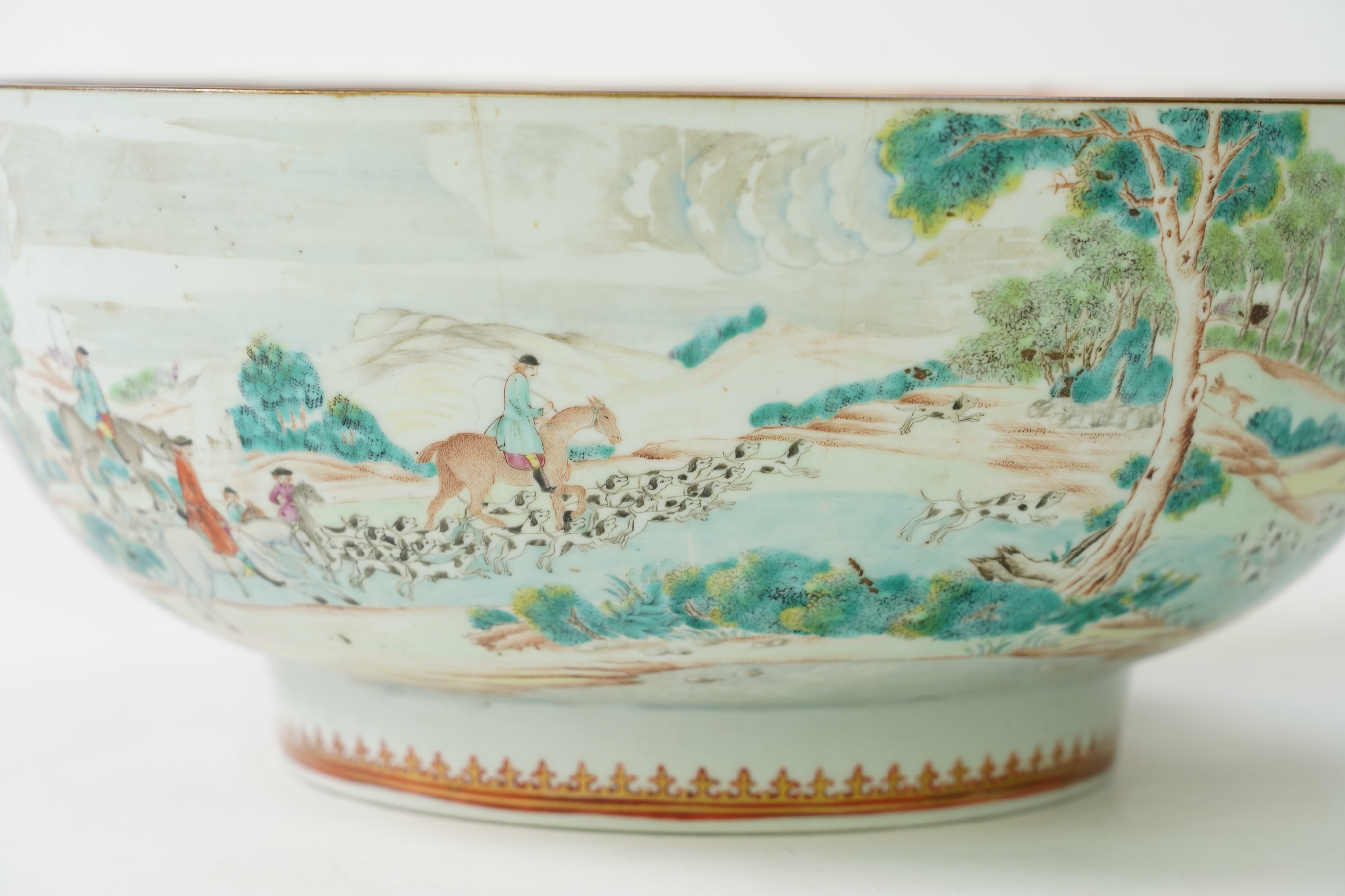 A large Chinese European subject ‘hunting’ punch bowl, Qianlong period